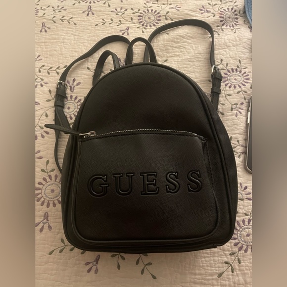 COPY - This is a small Guess brand backpack, new and unused. - Picture 1 of 4